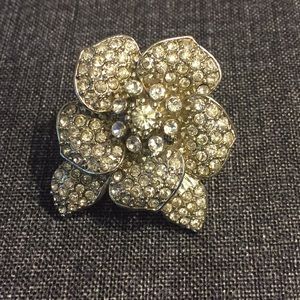 Silver flower pin w/ crystals